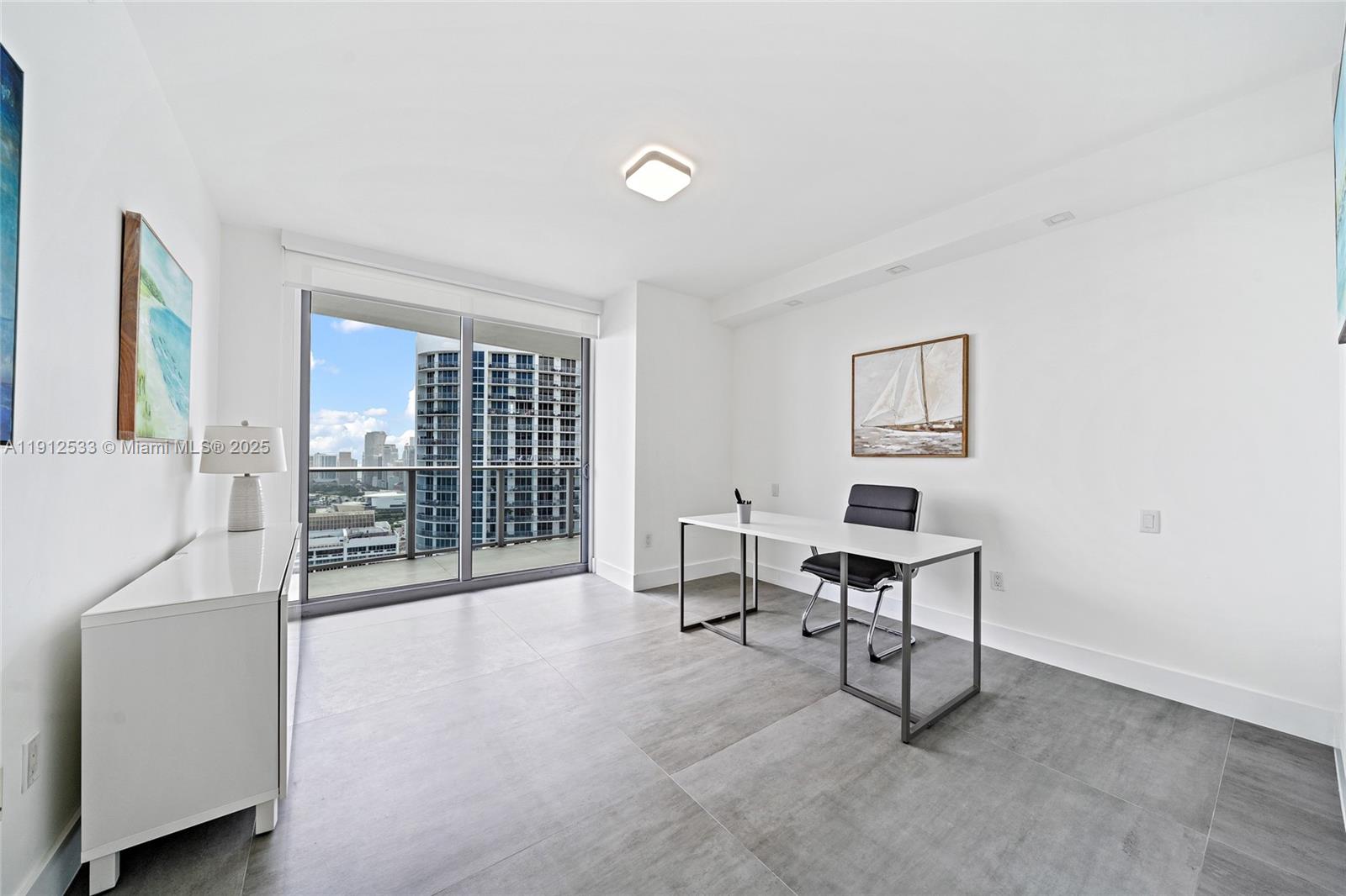 488 Northeast 18th Street, Unit 4612 Miami, FL 33132 - Photo 11 of 42 a view of a livingroom with furniture and a window