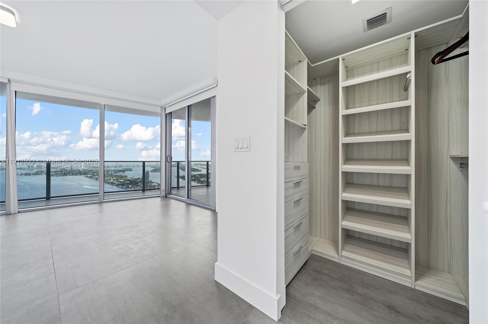 488 Northeast 18th Street, Unit 4612 Miami, FL 33132 - Photo 14 of 42 a view of an empty room with a window