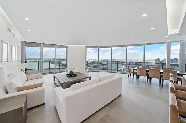 a view of a hallway with washer and dryer