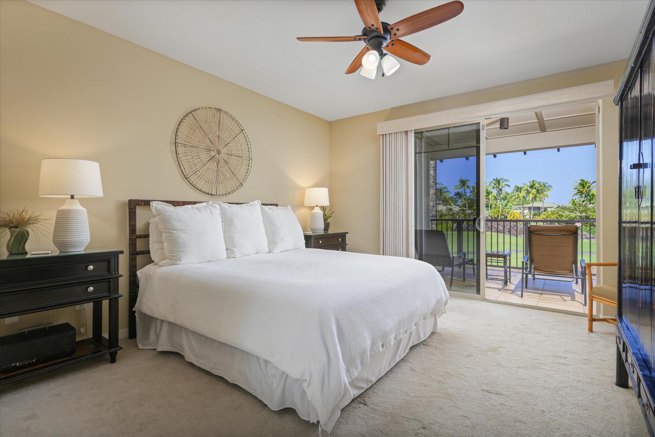 68-1122 Na Ala Hele Road, Unit G3 Kamuela, HI 96743 - Photo 19 of 30 a bedroom with a bed and wooden floor