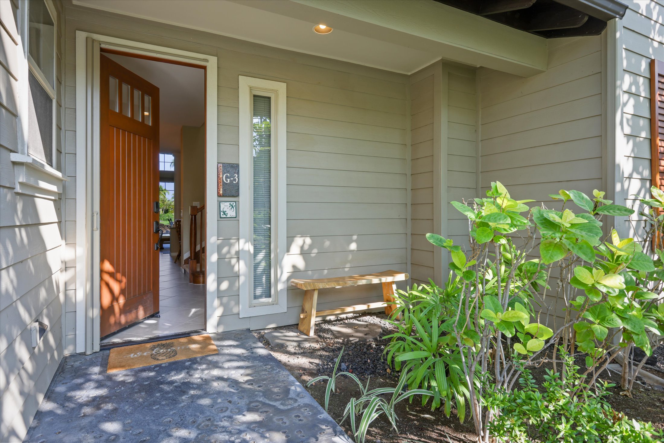 68-1122 Na Ala Hele Road, Unit G3 Kamuela, HI 96743 - Photo 5 of 30 a backyard of a house with outdoor seating