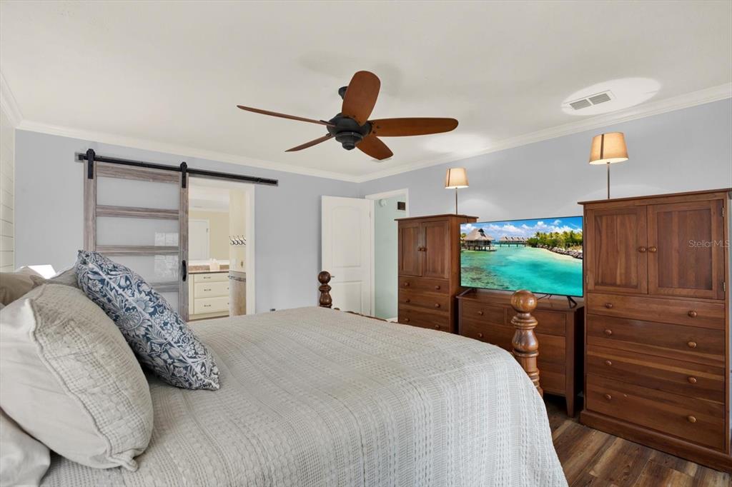 2806 Fairway View Drive Valrico, FL 33596 - Photo 12 of 45 a bedroom with a bed and a dresser