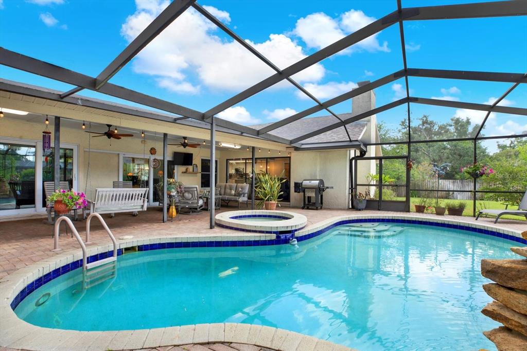 2806 Fairway View Drive Valrico, FL 33596 - Photo 39 of 45 a view of a swimming pool with a patio