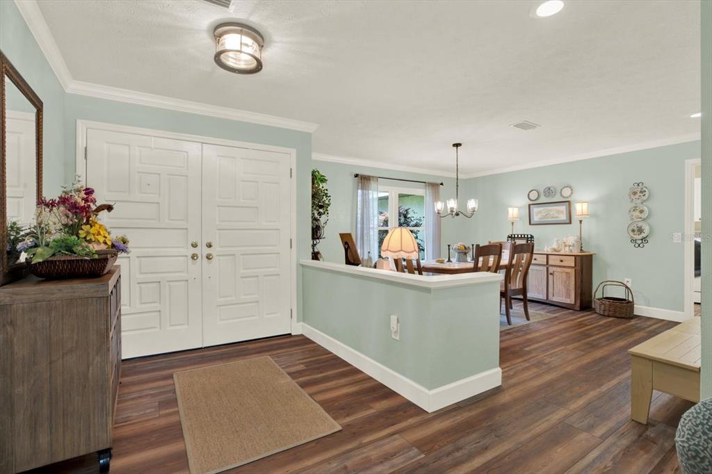 2806 Fairway View Drive Valrico, FL 33596 - Photo 5 of 45 a living room with furniture and a wooden floor