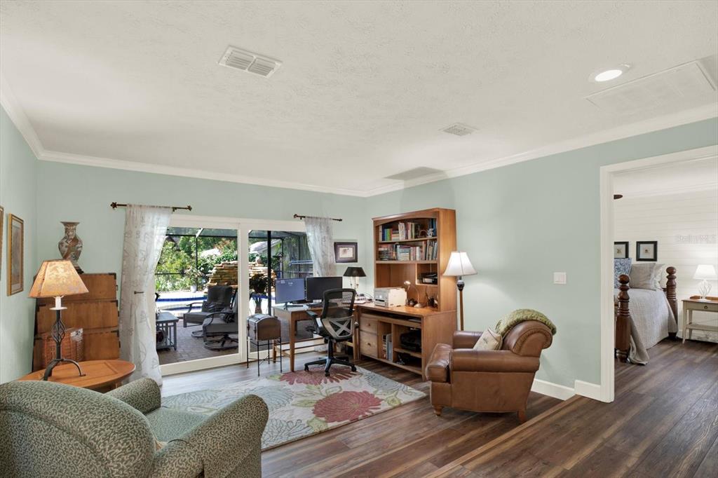 2806 Fairway View Drive Valrico, FL 33596 - Photo 9 of 45 a living room with furniture and a wooden floor