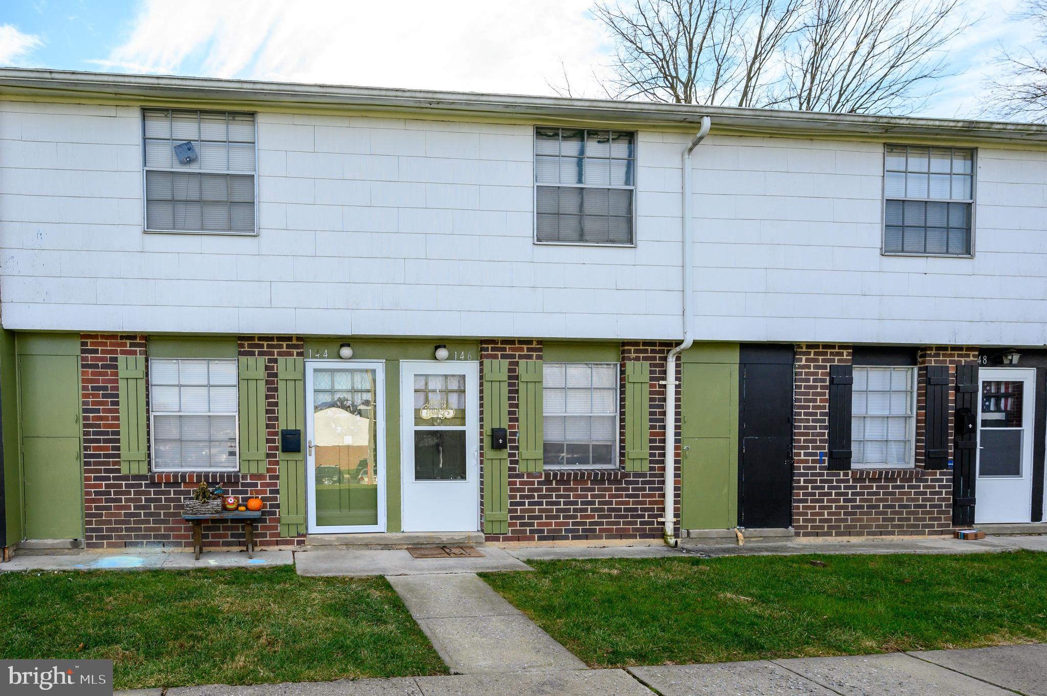 137 Roberta Jean Avenue Littlestown, PA 17340 - Photo 8 of 8 a front view of a house with a yard and table