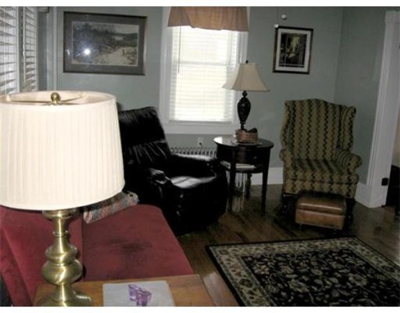 36 East Leverett Road Amherst, MA 01002 - Photo 6 of 18 a living room with furniture rug and window