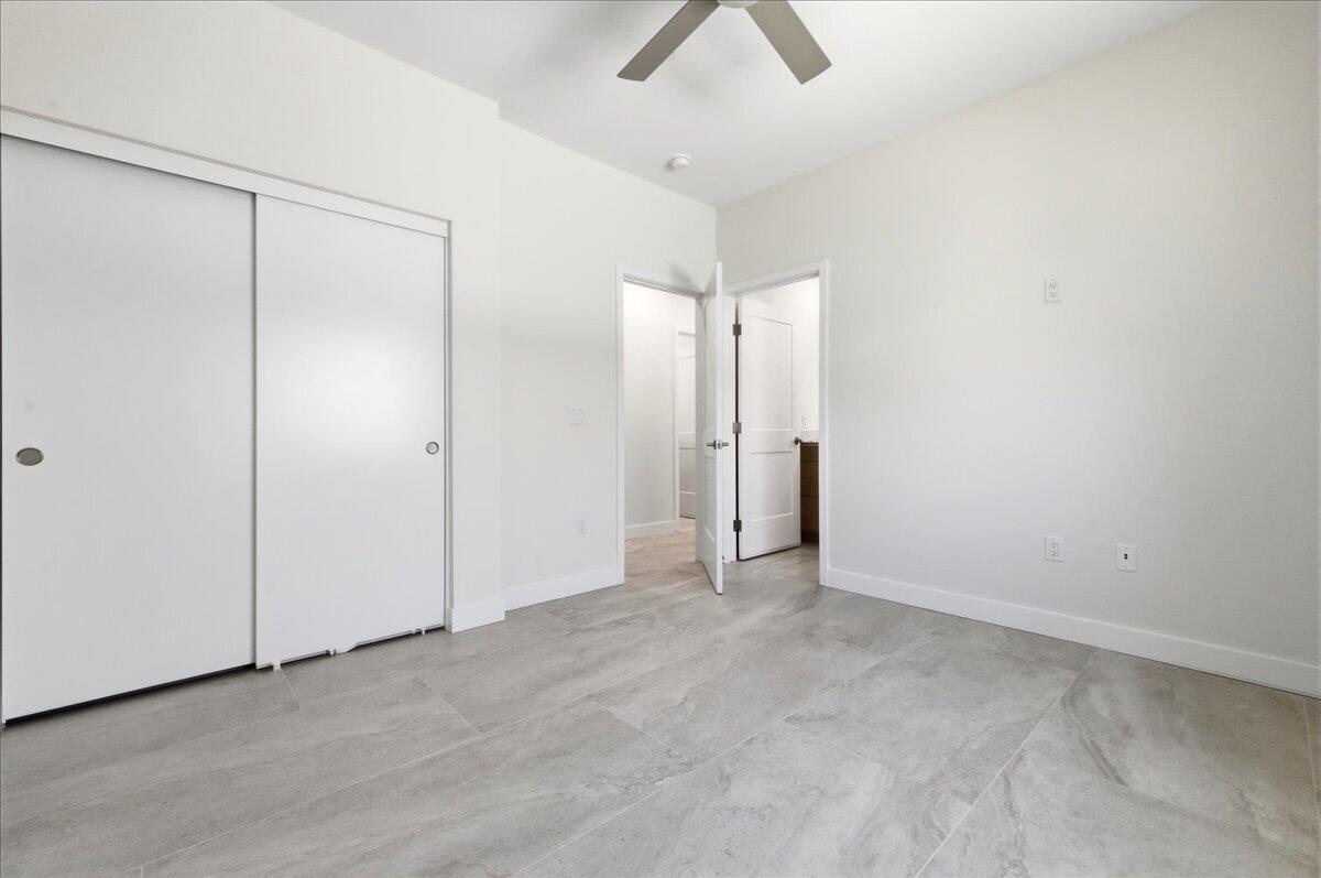 68160 Modalo Road Cathedral City, CA 92234 - Photo 46 of 57 an empty room with closet and windows