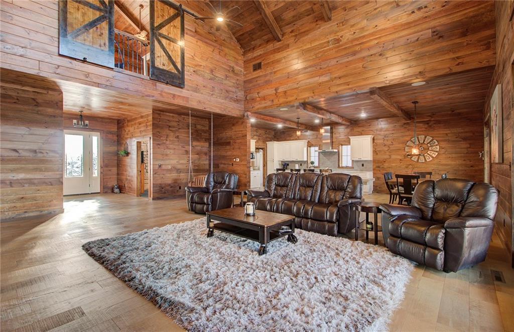 122 Klein Road Cranberry Township, PA 16066 - Photo 2 of 25 Stunning is an understatement as you enter the PINE open concept entry, 26' high family room and eat-in kitchen with wood beams, walls, barn doors and flooring.