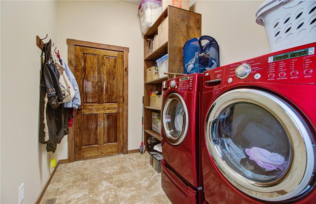 122 Klein Road Cranberry Township, PA 16066 - Photo 12 of 25 Main level laundry with tile flooring off the master closet. Solid wood doors featured throughout the home.