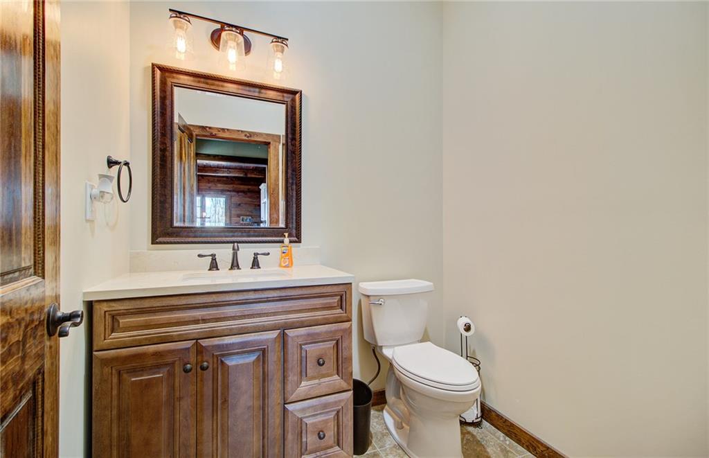 122 Klein Road Cranberry Township, PA 16066 - Photo 14 of 25 Powder room with tile flooring and granite vanity.