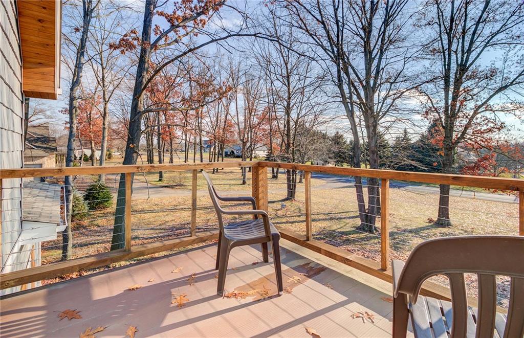 122 Klein Road Cranberry Township, PA 16066 - Photo 18 of 25 Private deck off of the upper level bedroom with aluminum waterproof decking and wire rails.