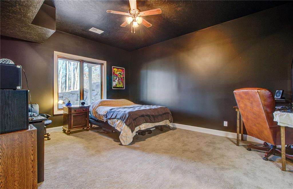 122 Klein Road Cranberry Township, PA 16066 - Photo 22 of 25 17x13 LL 4th bedroom with wood trim, egress window, ceiling light/fan, wall to wall carpeting and full ensuite.