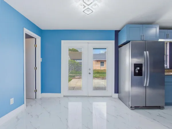 a view of an empty room and window