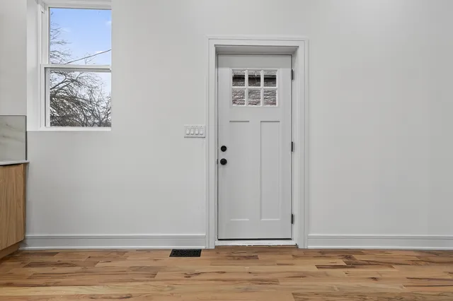 an aerial view of a city with lots of residential buildings