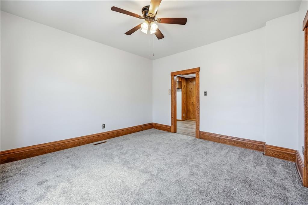 564 Spruce Avenue Sharon, PA 16146 - Photo 10 of 37 an empty room with closet and a ceiling fan