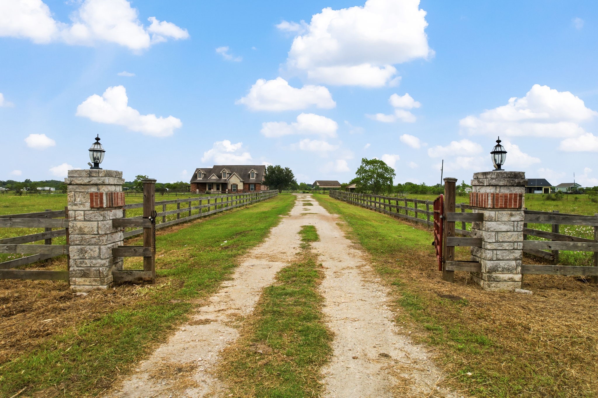 1405 Big Hill Road Winnie, TX 77665 - Photo 14 of 43 a view of a pathway with a wrought fence
