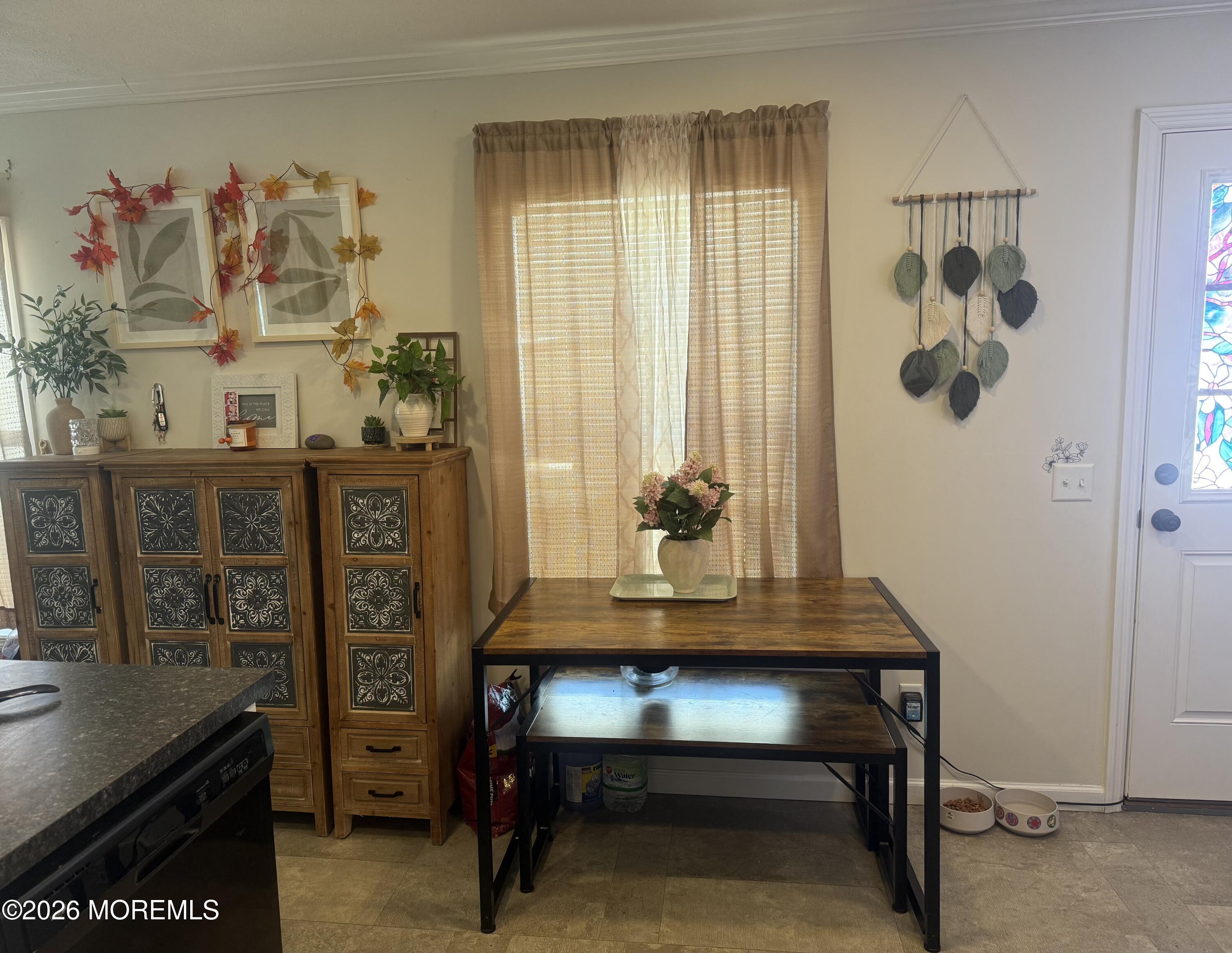 52 Monique Circle Hazlet, NJ 07730 - Photo 7 of 12 a bedroom with a table and a potted plant
