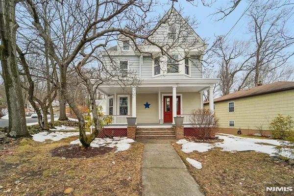 a front view of a house with a patio