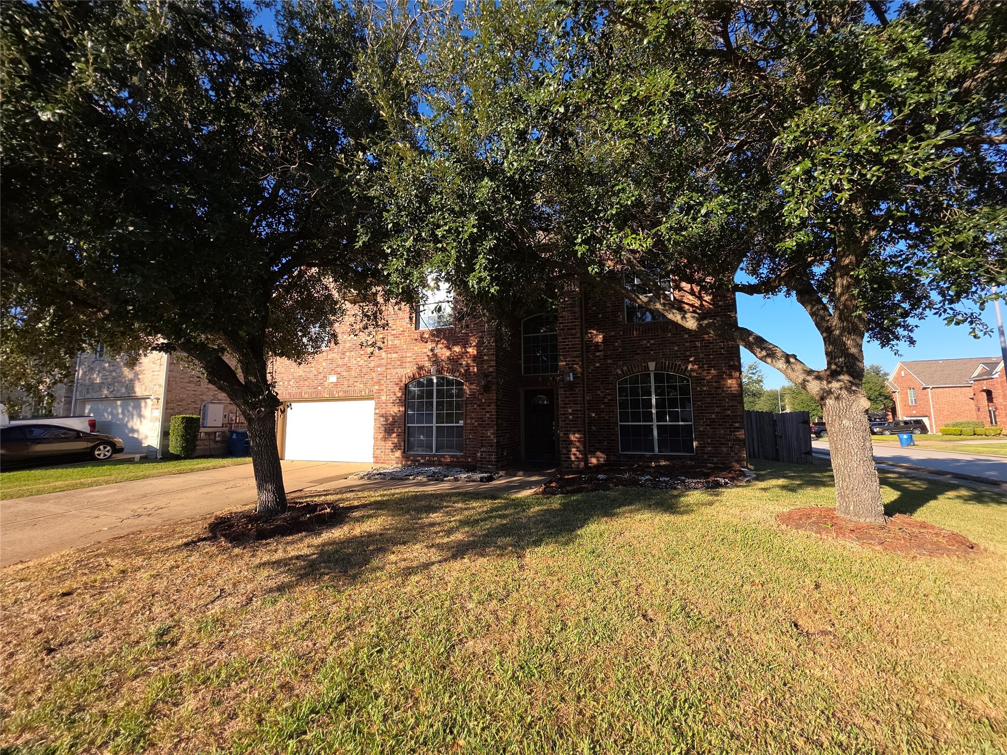 22231 Bridgestone Oak Drive Spring, TX 77388 - Photo 1 of 25 a view of a yard with a tree