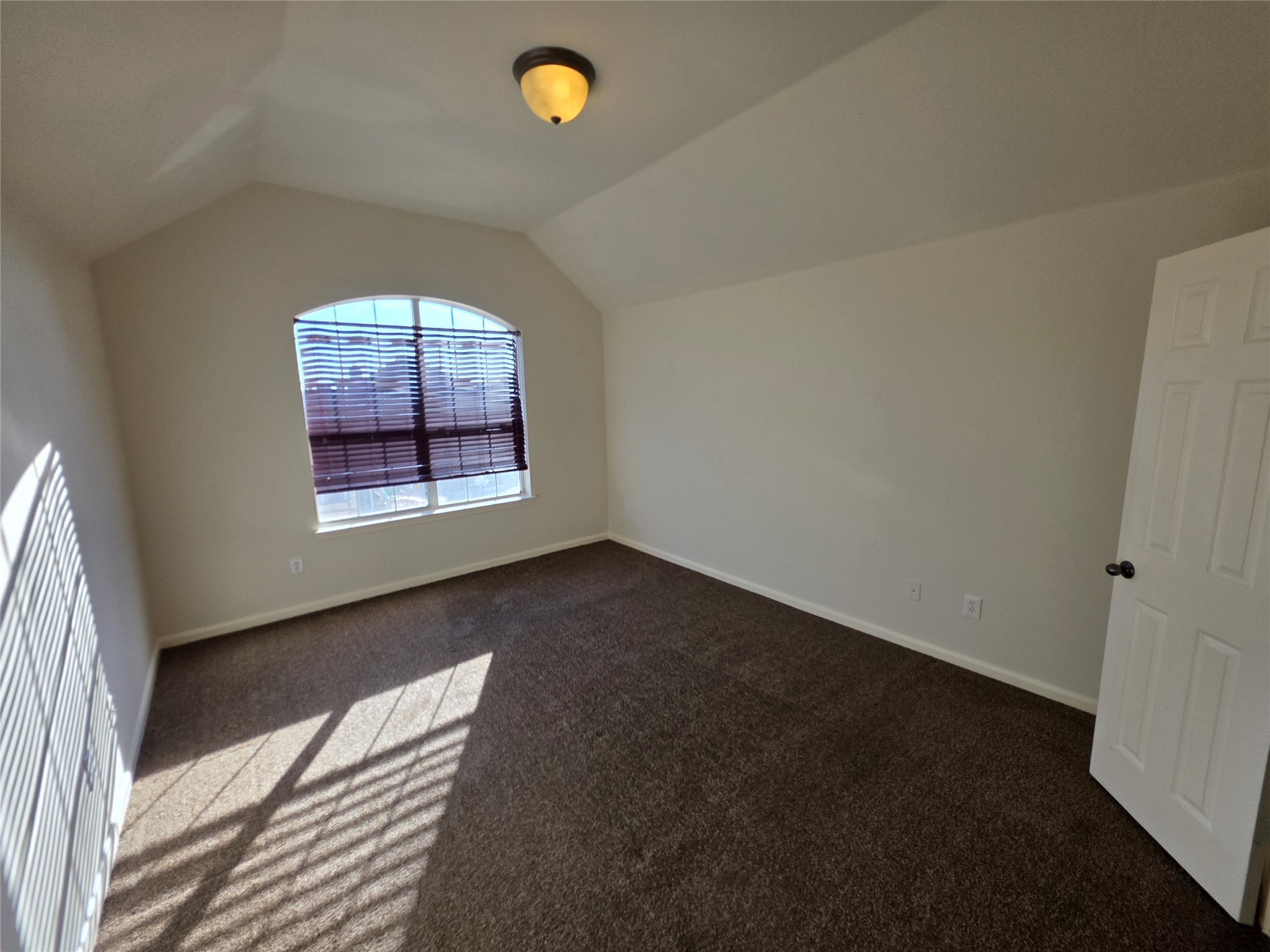 22231 Bridgestone Oak Drive Spring, TX 77388 - Photo 18 of 25 an empty room with windows