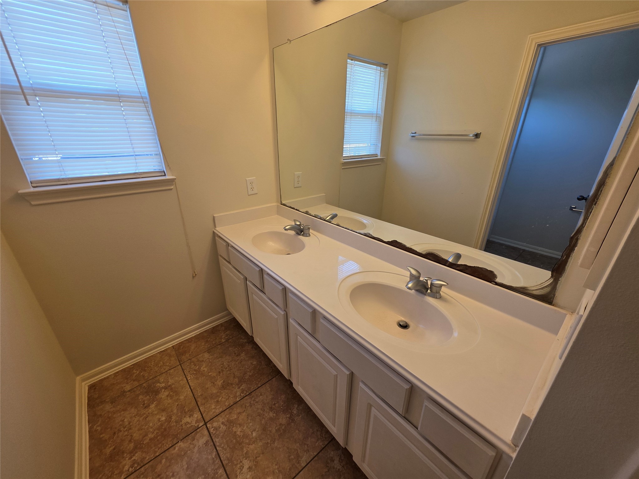 22231 Bridgestone Oak Drive Spring, TX 77388 - Photo 23 of 25 a bathroom with a sink and a mirror