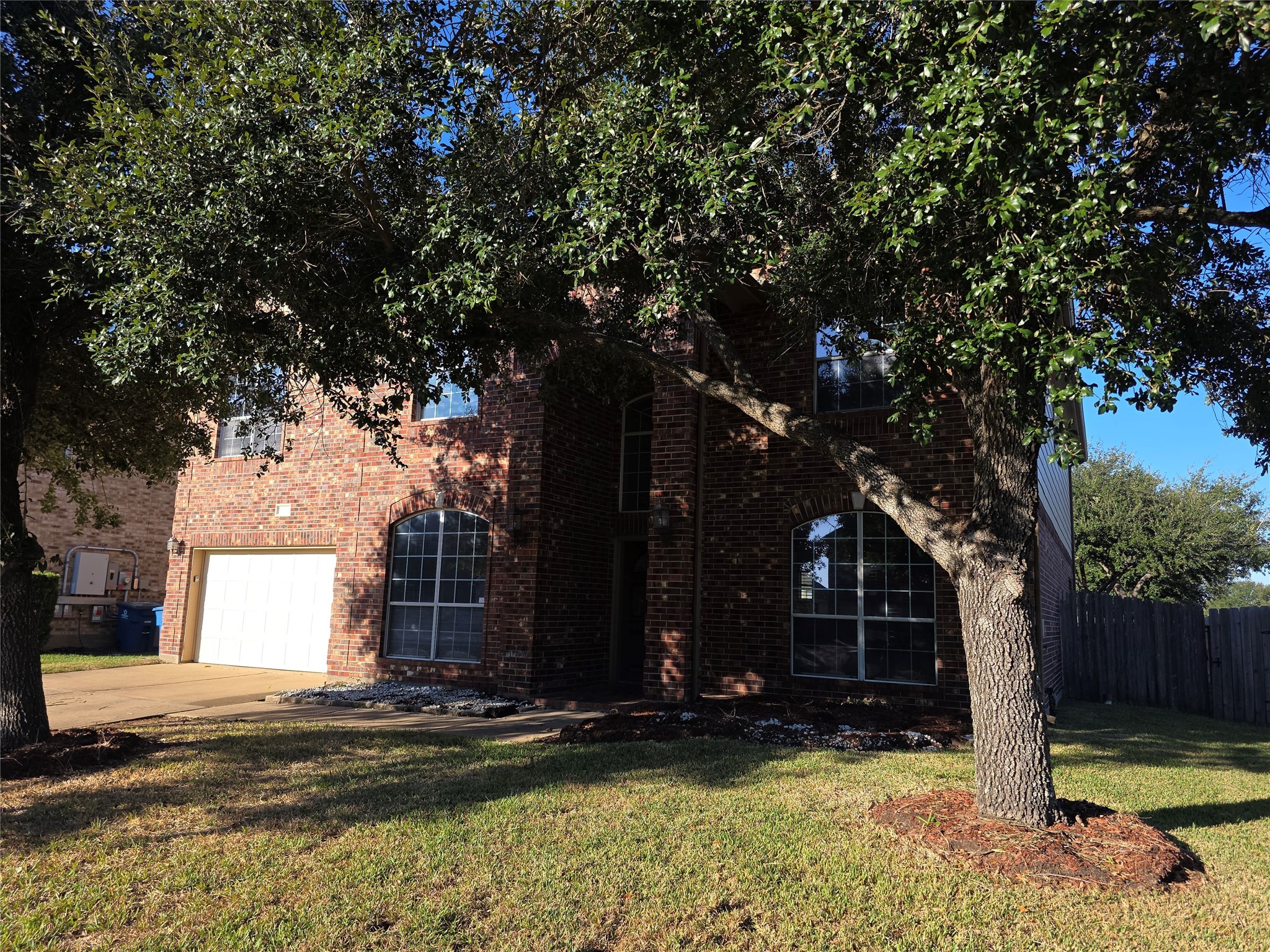 22231 Bridgestone Oak Drive Spring, TX 77388 - Photo 3 of 25 a view of a house with a tree in front of it