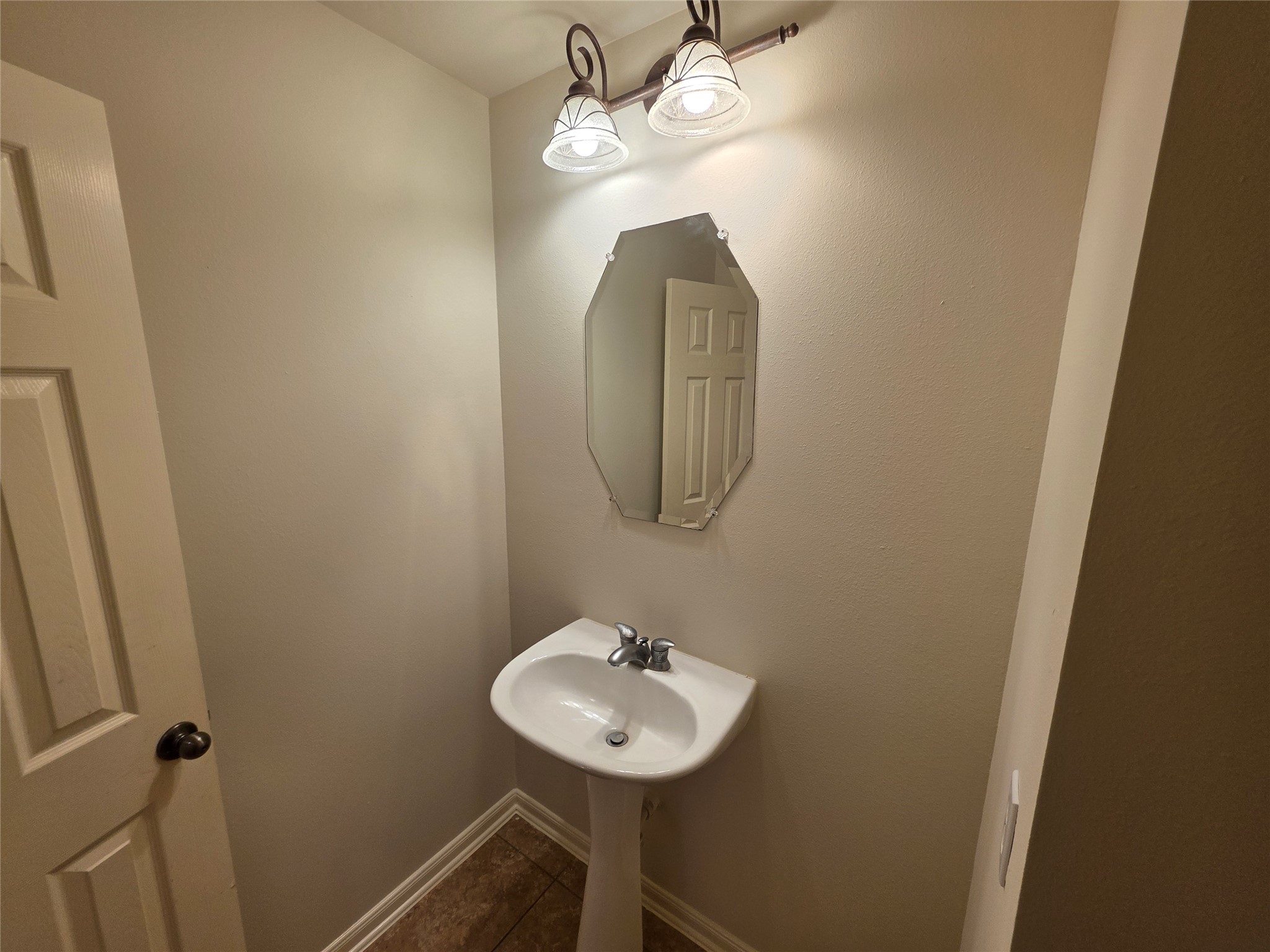 22231 Bridgestone Oak Drive Spring, TX 77388 - Photo 7 of 25 a bathroom with a sink and a mirror