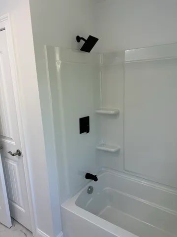 a view of hallway with closet