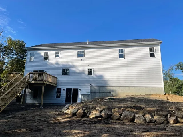 a front view of a house with a balcony