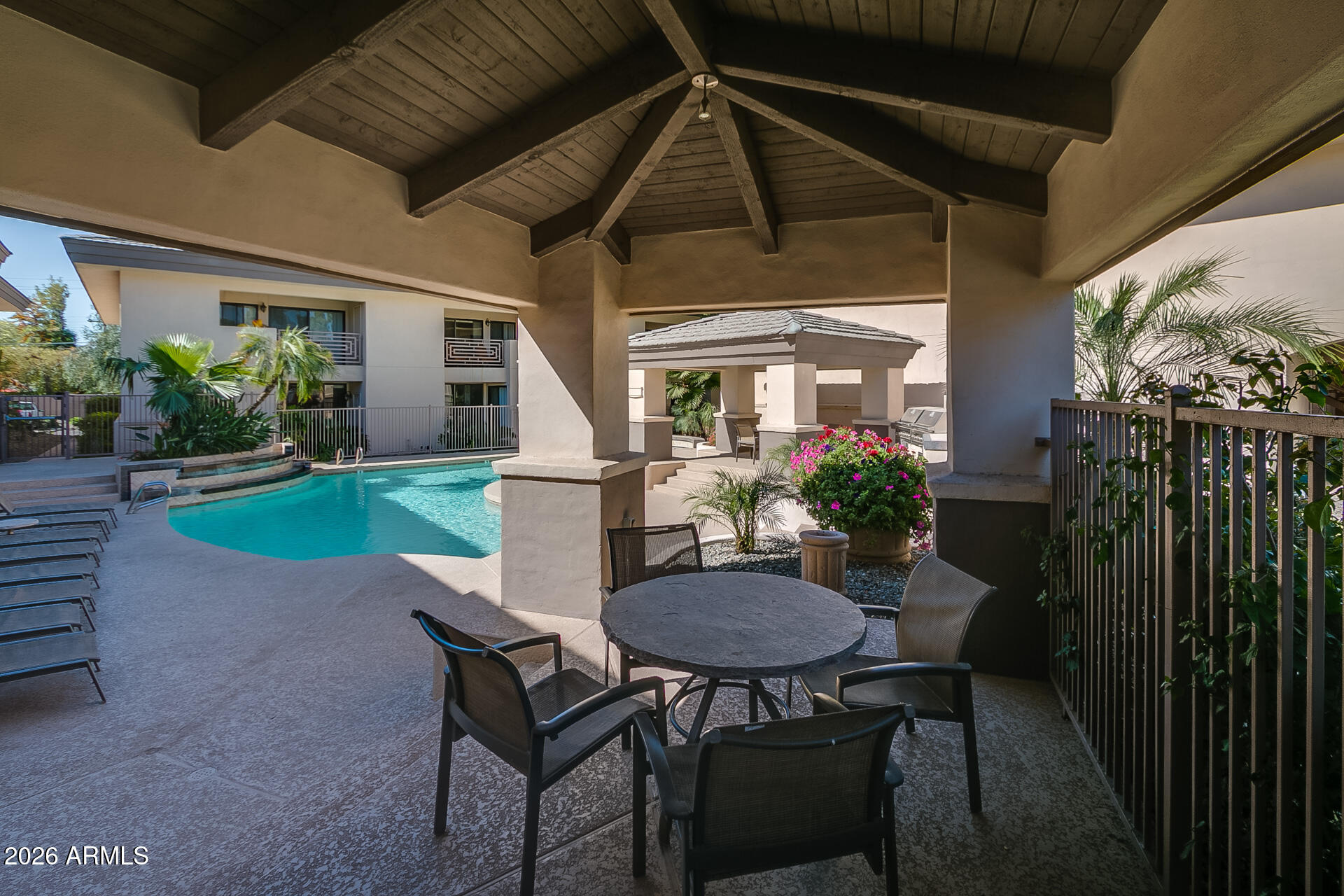 3235 East Camelback Road, Unit 211 Phoenix, AZ 85018 - Photo 17 of 17 Community Pool Cottages