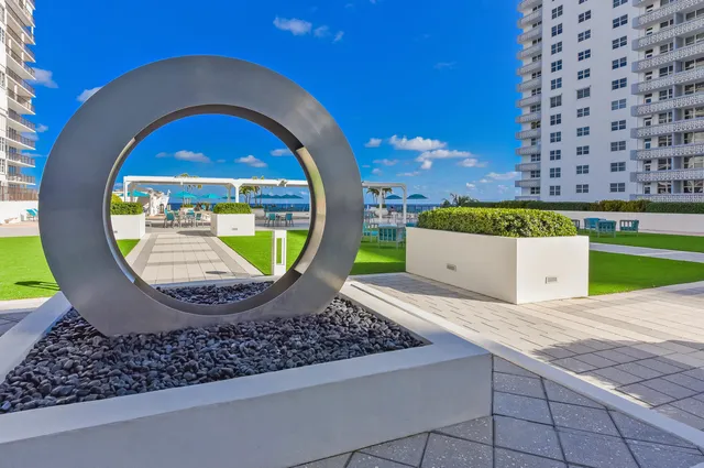 a view of swimming pool from a yard