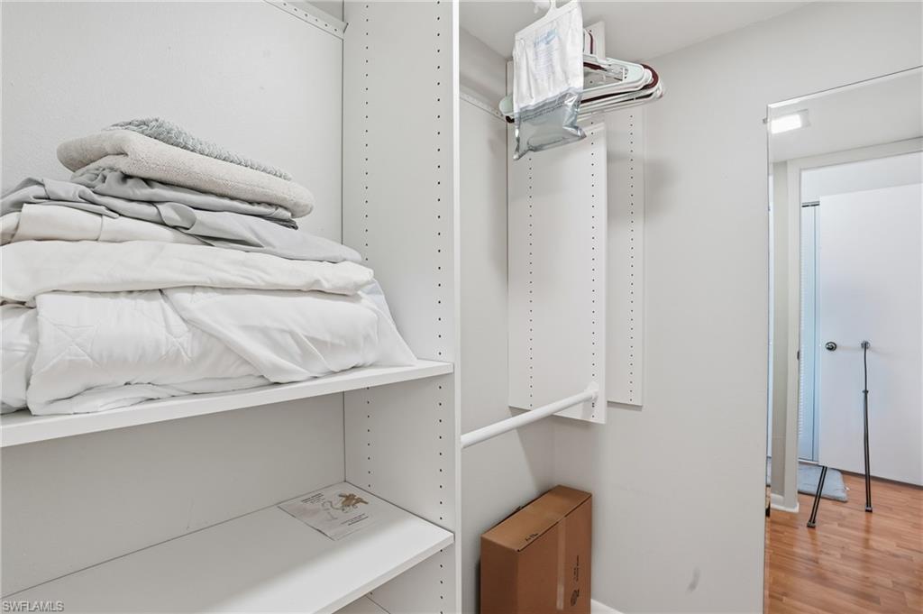2875 Palm Beach Boulevard, Unit 202 Fort Myers, FL 33916 - Photo 24 of 38 a view of walk in closet with empty racks