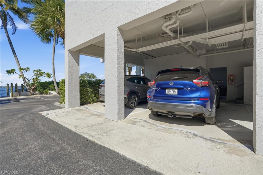 2875 Palm Beach Boulevard, Unit 202 Fort Myers, FL 33916 - Photo 26 of 38 a car parked in front of a building