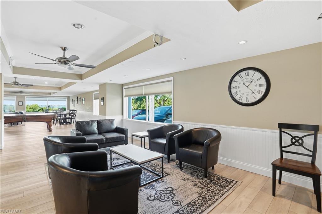 2875 Palm Beach Boulevard, Unit 202 Fort Myers, FL 33916 - Photo 34 of 38 a living room with furniture and a large window