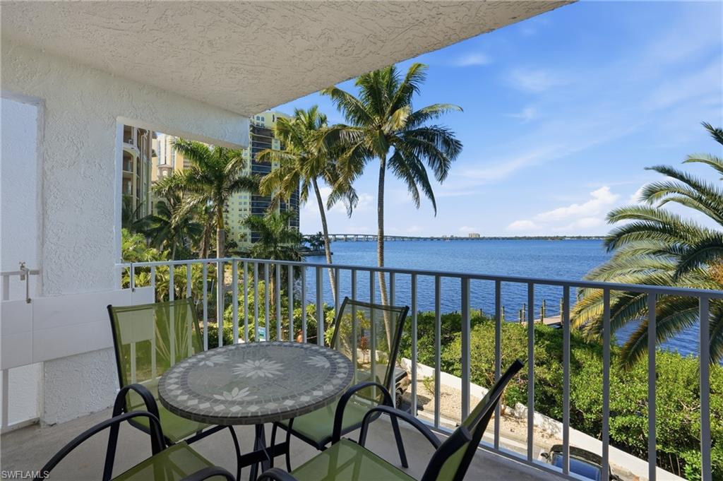 2875 Palm Beach Boulevard, Unit 202 Fort Myers, FL 33916 - Photo 9 of 38 a view of a balcony with furniture