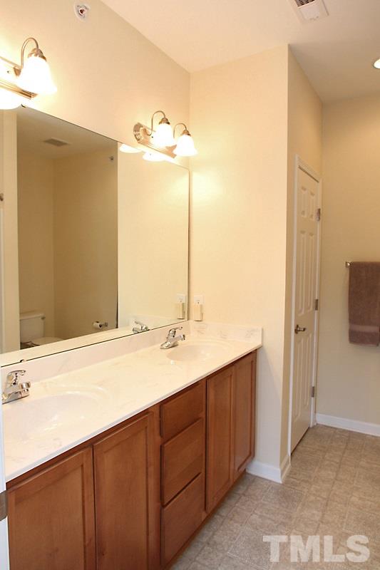 523 Weather Ridge Lane, Unit 523 Cary, NC 27513 - Photo 12 of 18 The master bath of course has a double sink vanity with lots of storage, including a linen closet
