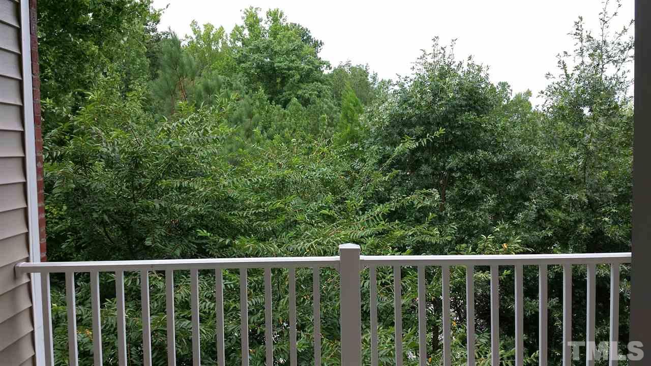 523 Weather Ridge Lane, Unit 523 Cary, NC 27513 - Photo 17 of 18 The balcony has a beautiful tree view