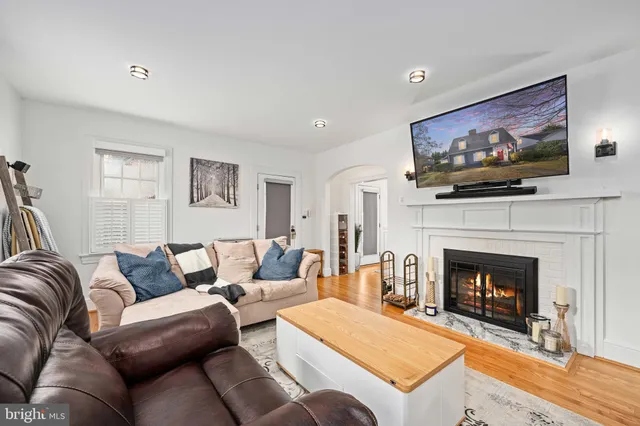 a kitchen with stainless steel appliances granite countertop a stove refrigerator and cabinets