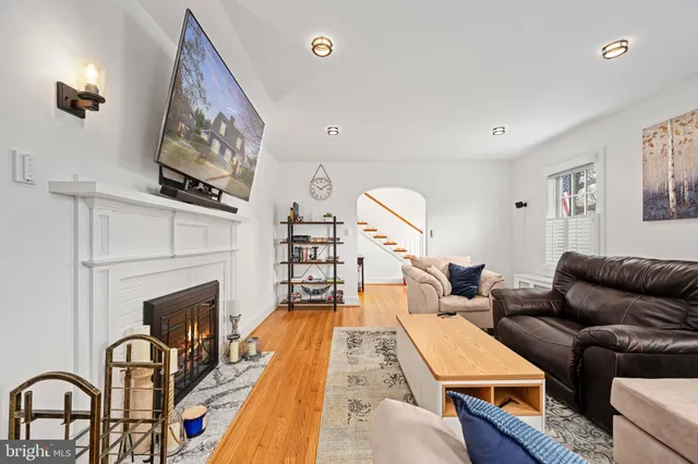 a kitchen with stainless steel appliances a sink a stove and a window