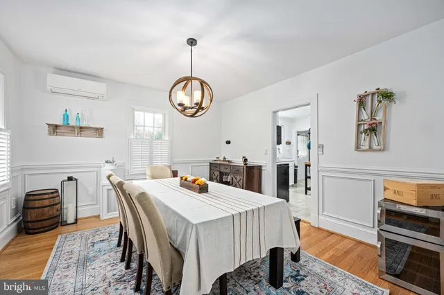 a kitchen with stainless steel appliances a stove a refrigerator and a cabinets