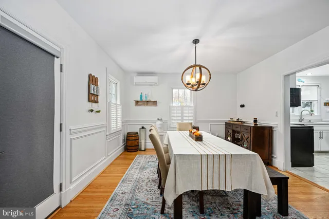 a kitchen with a refrigerator and cabinets