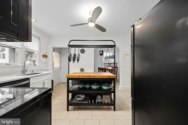 a bathroom with a toilet a sink and a shower