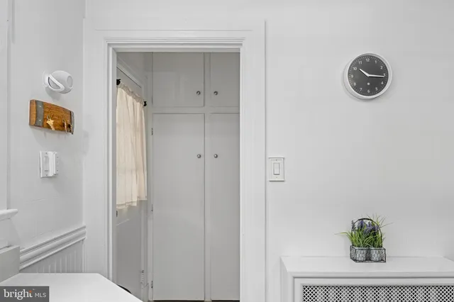 a view of a livingroom with furniture and a window
