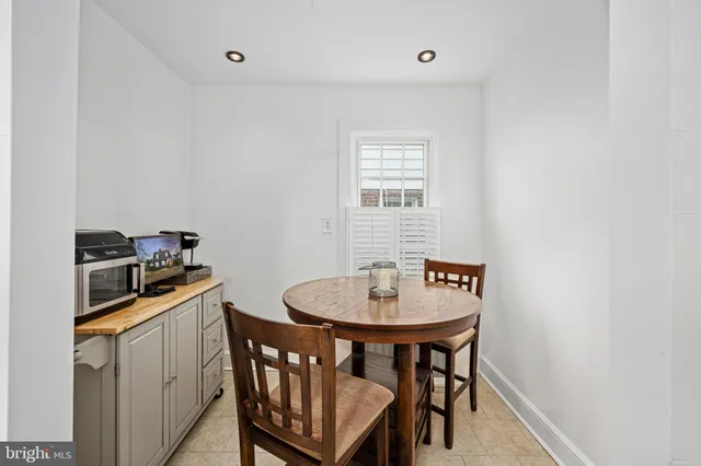 a workspace with furniture and a window