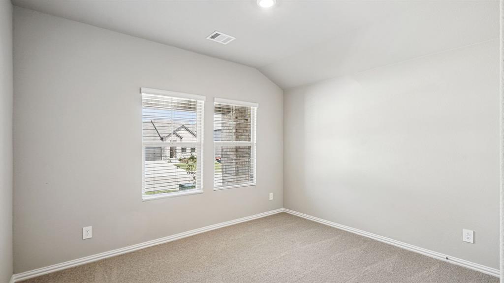 2120 Rannoch Street Sherman, TX 75092 - Photo 17 of 36 an empty room with windows