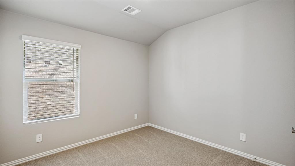 2120 Rannoch Street Sherman, TX 75092 - Photo 19 of 36 an empty room with a window