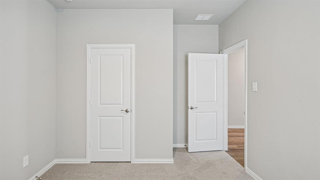 2120 Rannoch Street Sherman, TX 75092 - Photo 20 of 36 an empty room with windows