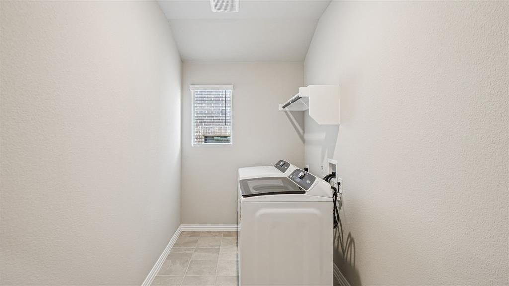 2120 Rannoch Street Sherman, TX 75092 - Photo 22 of 36 a utility room with dryer and washer