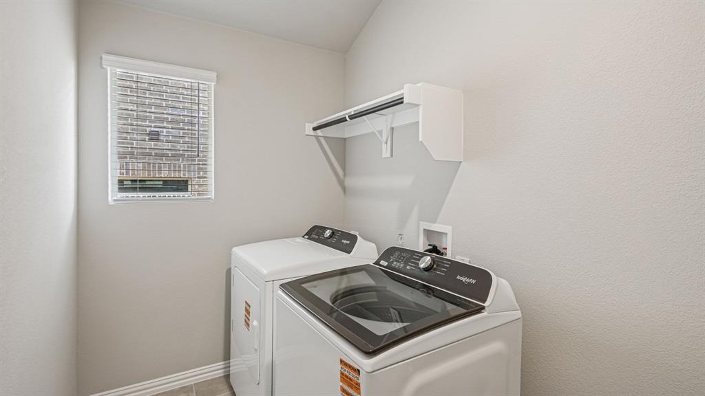 2120 Rannoch Street Sherman, TX 75092 - Photo 23 of 36 a utility room with dryer and washer